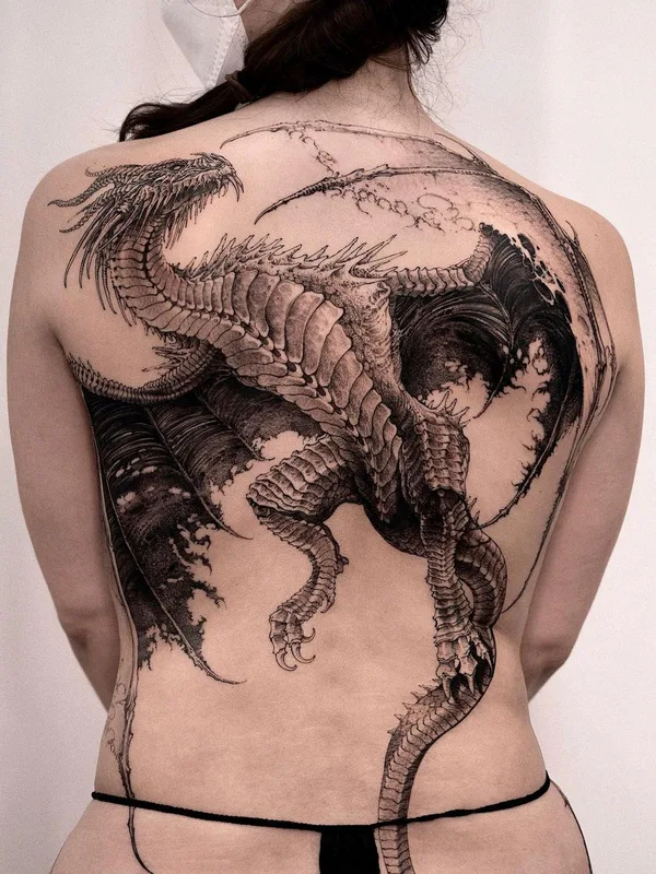 female black and grey realism tattoo on full back #57451 | Tattoo Artist Hoon_unco