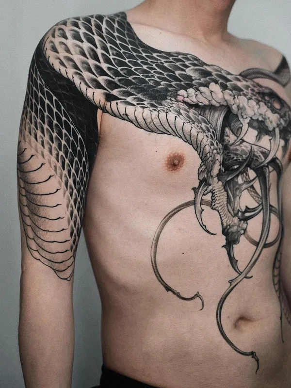 male black and grey blackwork tattoo on chest #57447 | Tattoo Artist Hoon_unco