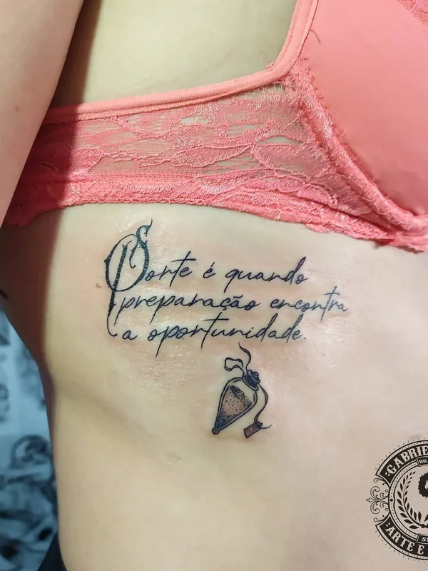 female black calligraphy татуировка на ribcage #32591 | Тату мастер Gabriel Silva