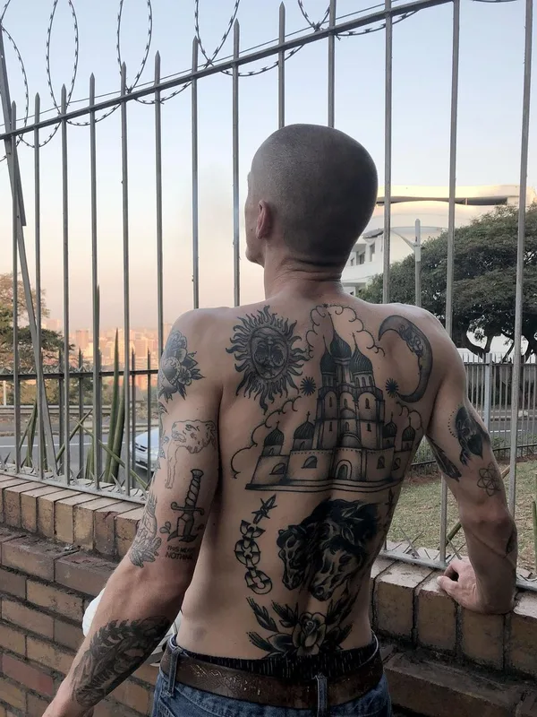 male black and grey blackwork tattoo on full back #63075 | Tattoo Artist Shaun Dean