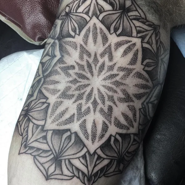 Ornamental tattoo by Jon James Case in Wilderness