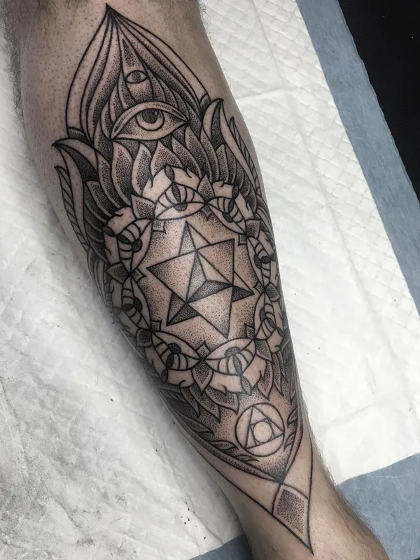 black and grey blackwork tattoo on calf #63103 | Tattoo Artist Jon James Case