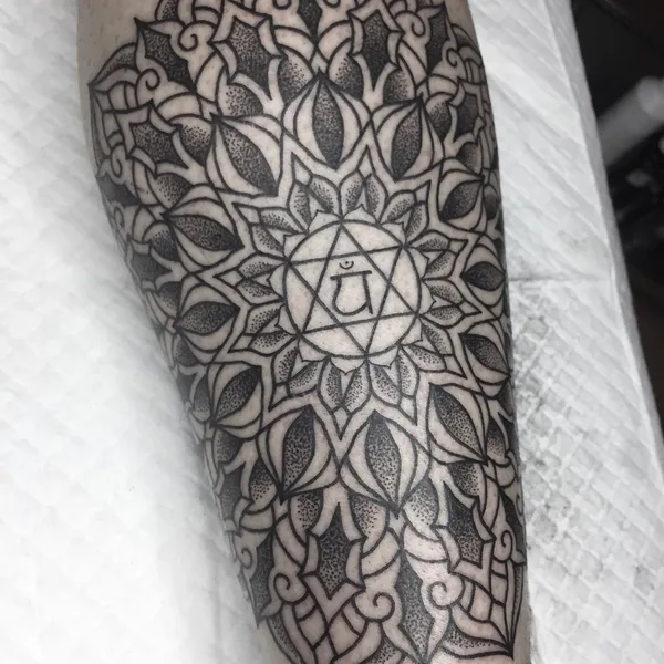 Ornamental tattoo by Jon James Case in Wilderness