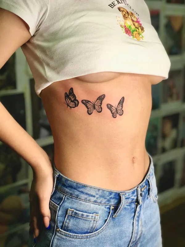female black fineline Tatuaggio su ribcage #52287 | Tatuatore Вовка Это