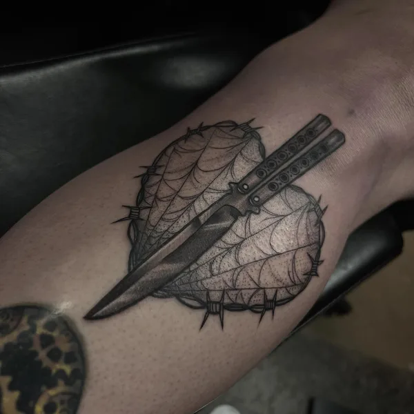 Graphic tattoo by Alex Barraza in Oklahoma City