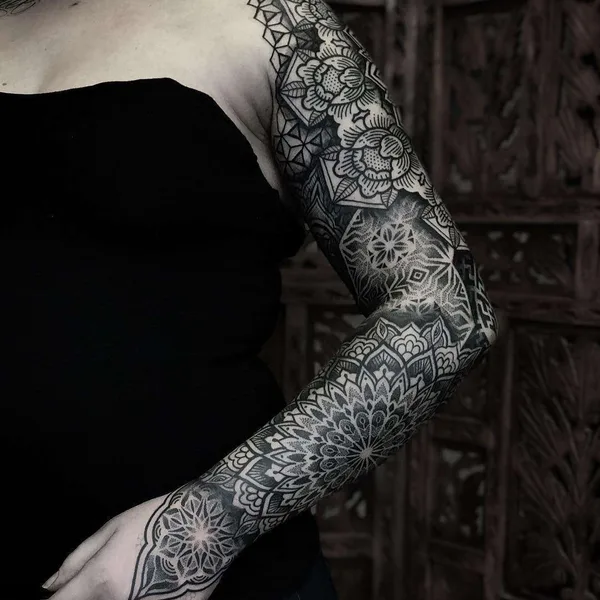 Dotwork tattoo by Caco Menegaz