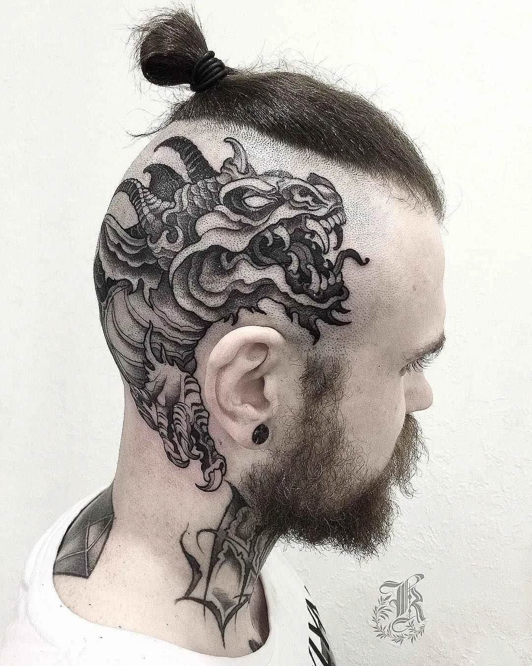 Tattoo artist Kristina Darmaeva authors dotwork tattoo