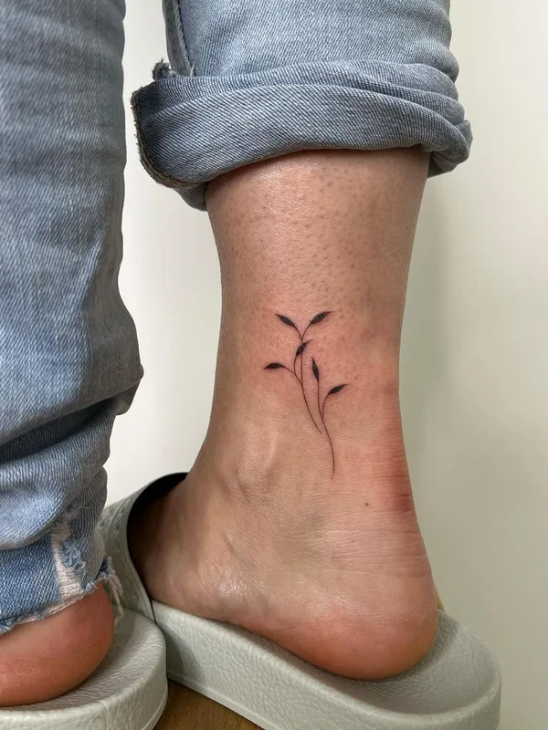 female black botanic, miniature, handpoke Tatuagem em leg #63307 | Tatuador Lara Maju