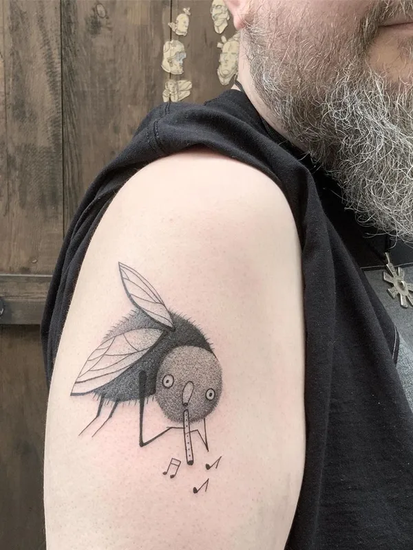 male black and grey illustrative tattoo auf upper arm #35301 | Tätowierer Wujek