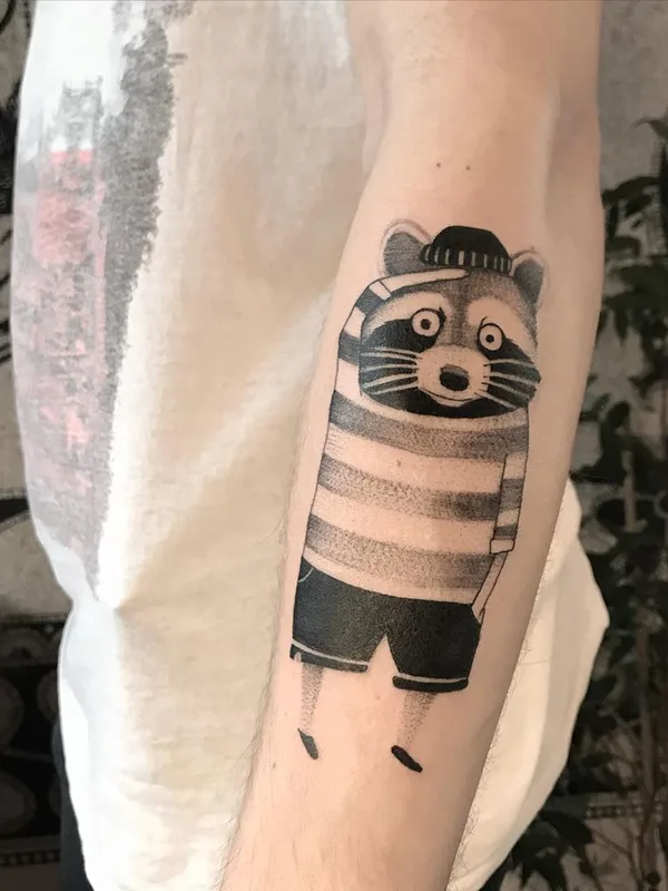 black and grey cartoon tattoo auf forearm #35295 | Tätowierer Wujek