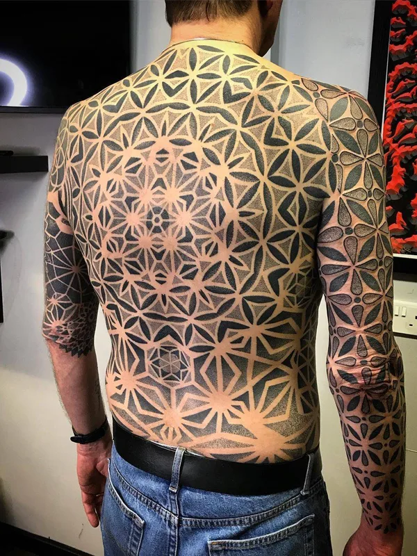 male black and grey geometric tattoo on full back #29252 | Tattoo Artist Deryn Twelve