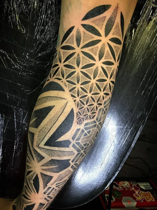 black geometric tattoo on forearm #29247 | Tattoo Artist Deryn Twelve