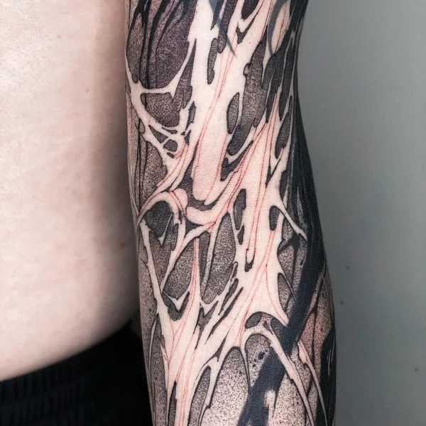 Graphic tattoo by daaamnj in Guangzhou