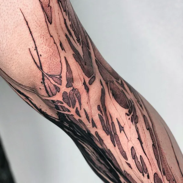 Graphic tattoo by daaamnj in Guangzhou