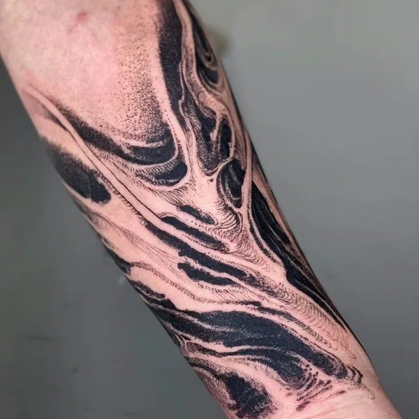 Graphic tattoo by daaamnj in Guangzhou