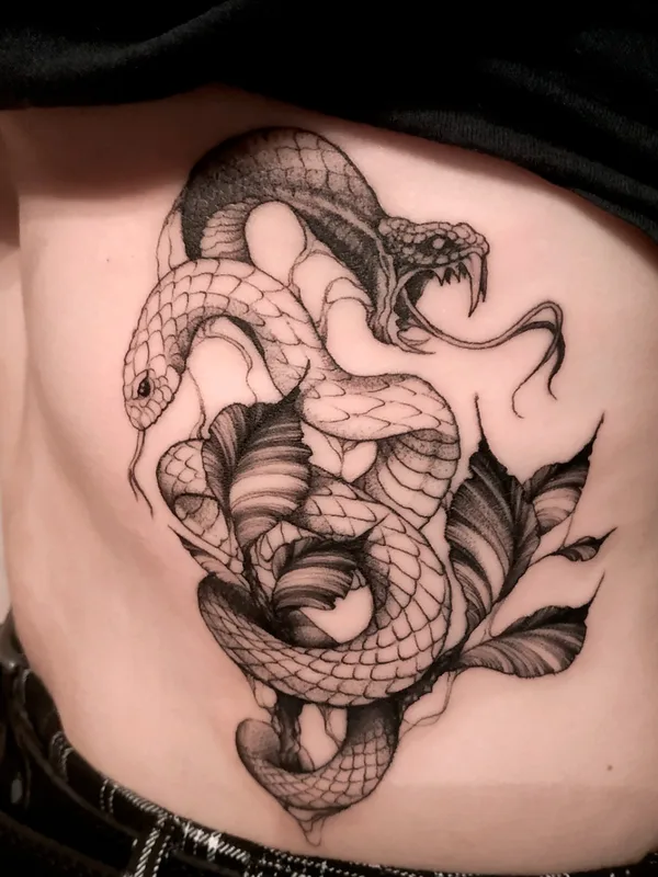 black and grey blackwork Tatuagem em side #55187 | Tatuador Oleg Tort