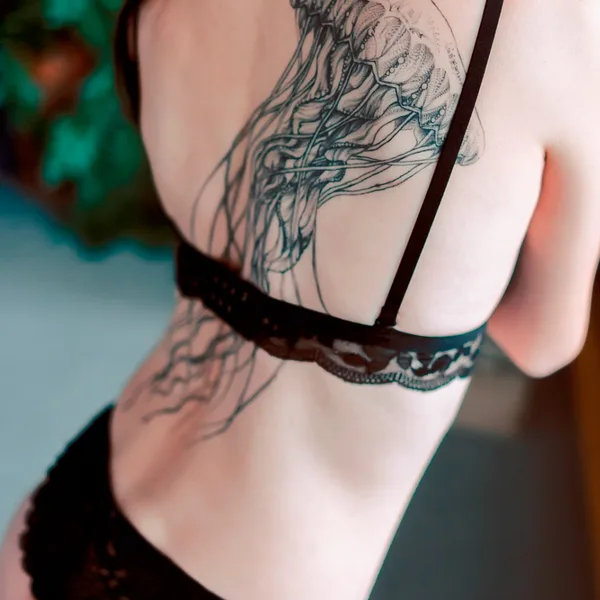Graphic tattoo by Oleg Tort in Сочи