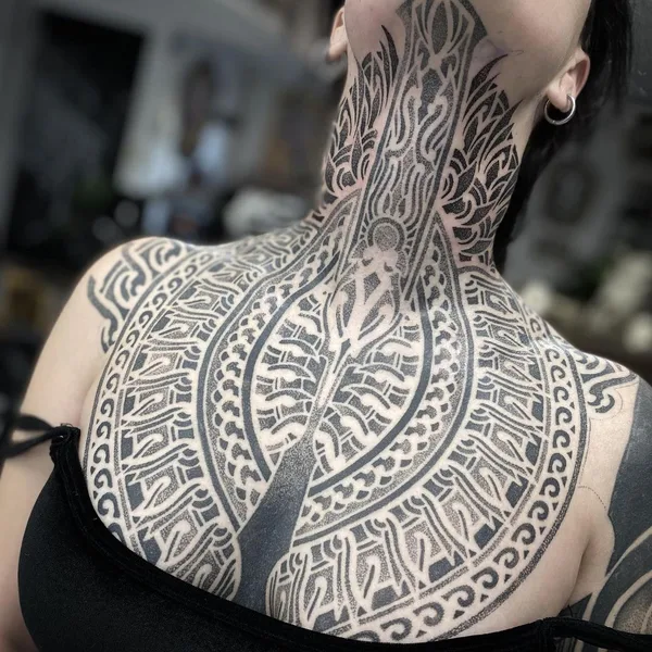 Ornamental tattoo by Israel Paketh in Buenos Aires