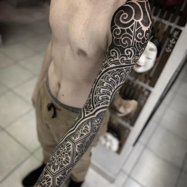 Ornamental tattoo by Israel Paketh in Buenos Aires