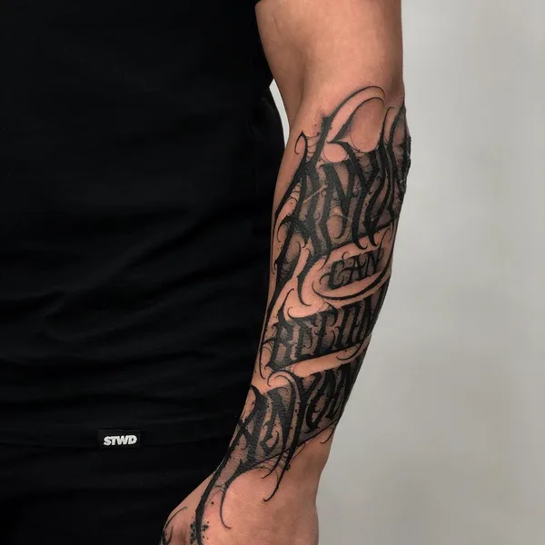 Lettering tattoo by Paul Soul in Gdańsk