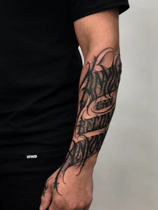 Lettering tattoo by Paul Soul in Gdańsk
