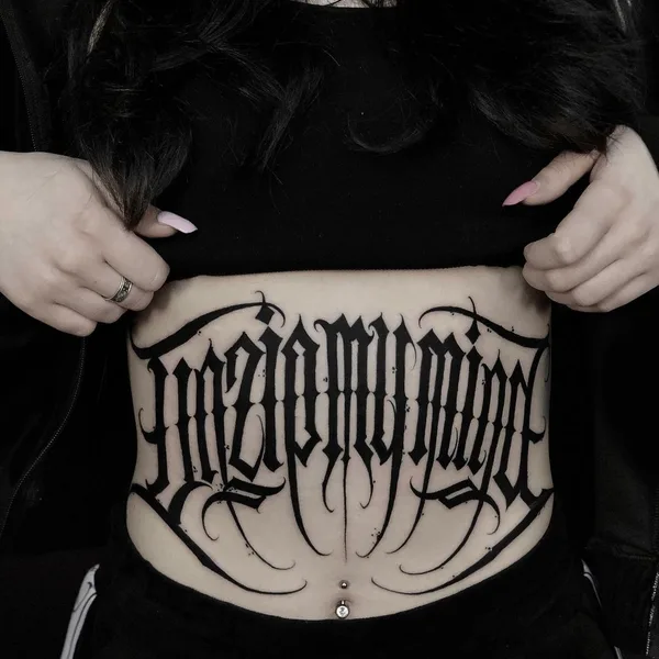 Lettering tattoo by Paul Soul in Gdańsk