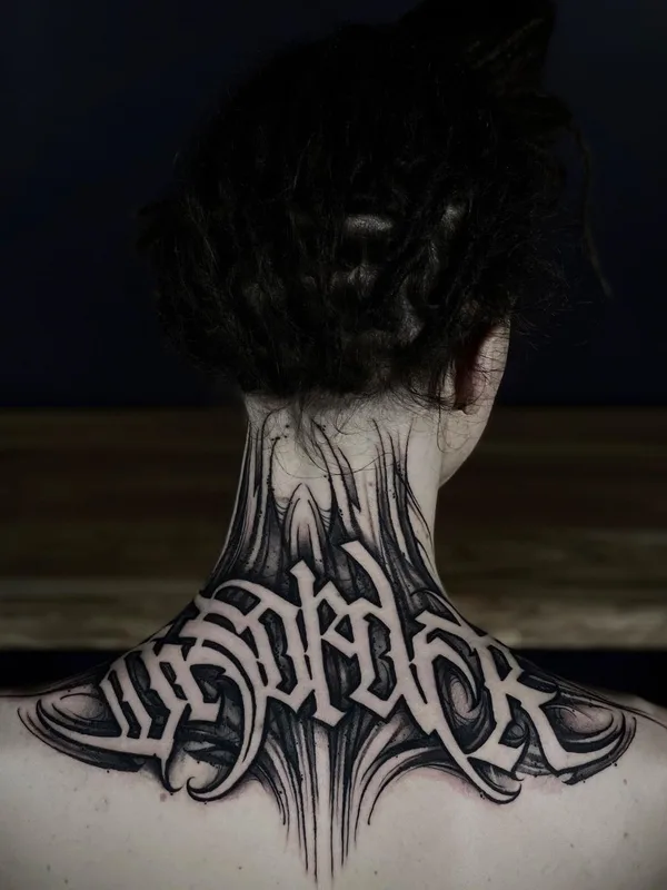 Lettering tattoo by Paul Soul in Gdańsk