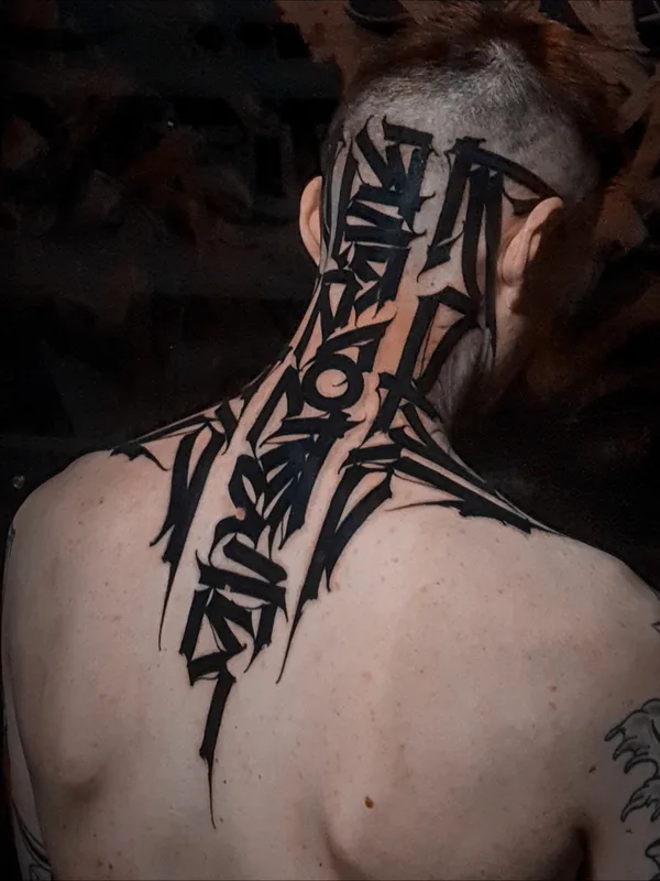 male black lettering татуировка на neck #55694 | Тату мастер Игорь Климин