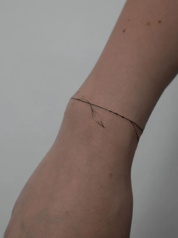 black fineline tattoo on wrist #52536 | Tattoo Artist Лера Шевцова