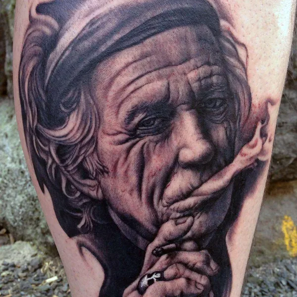 Portrait tattoo by Bob Tyrrell