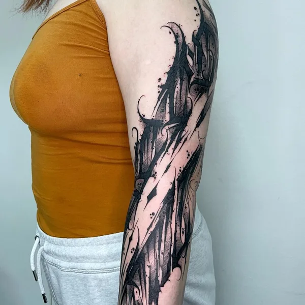 Lettering tattoo by Vladsaw in Metz