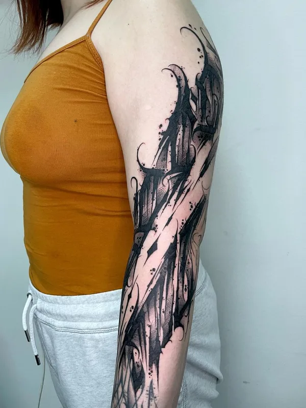 Lettering tattoo by Vladsaw in Metz