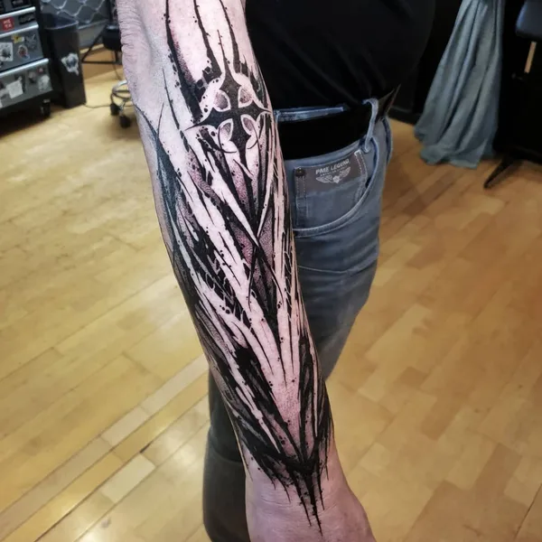 Lettering tattoo by Vladsaw in Metz