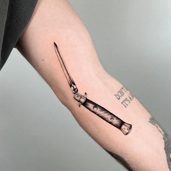 Graphic tattoo by Joshua Williams in London