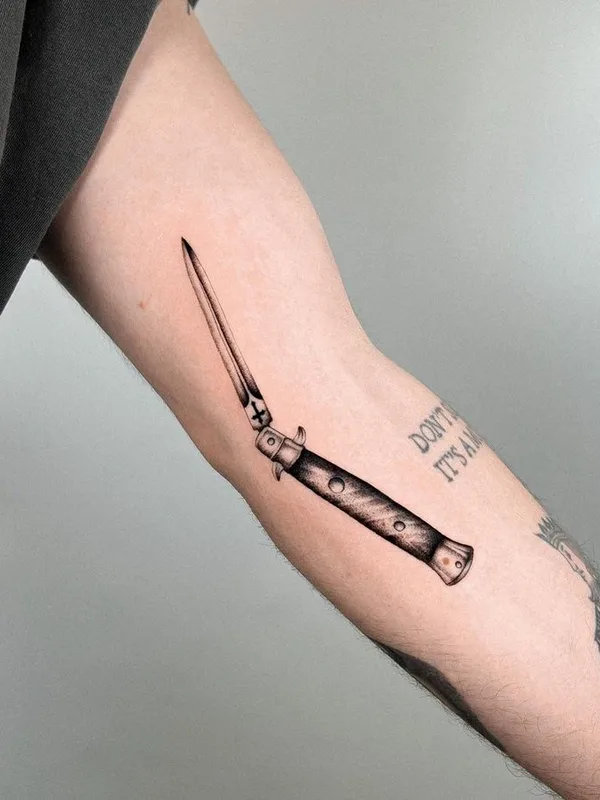 Graphic tattoo by Joshua Williams in London