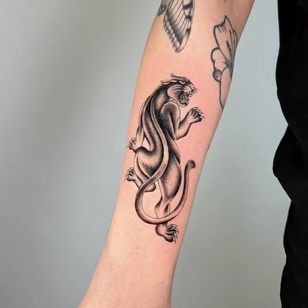 Graphic tattoo by Joshua Williams in London