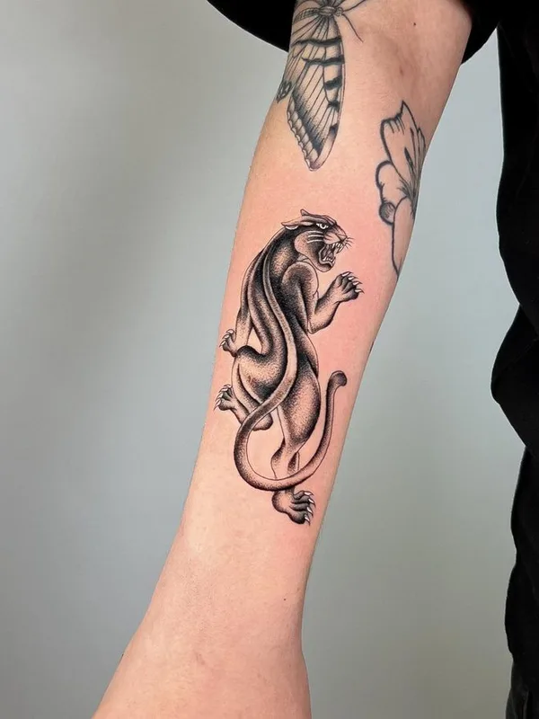 Graphic tattoo by Joshua Williams in London