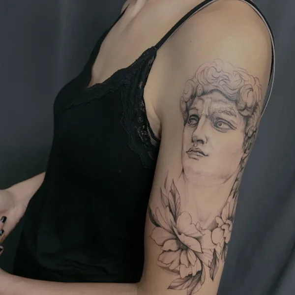Feminine tattoo by Jenya Willow in Батуми