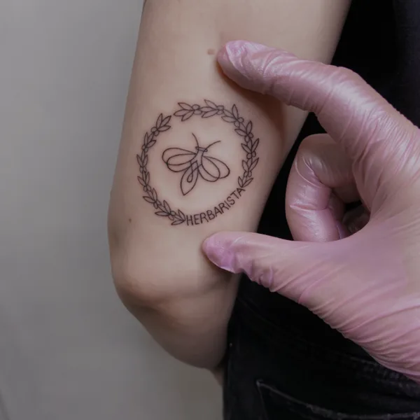 Feminine tattoo by Jenya Willow in Батуми