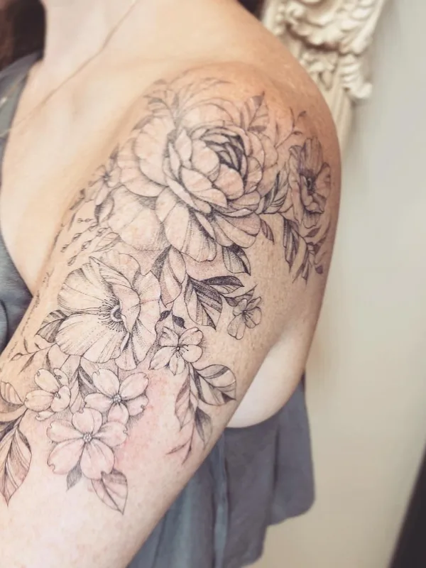 female black and grey linework tattoo on shoulder #63352 | Tattoo Artist Carla R