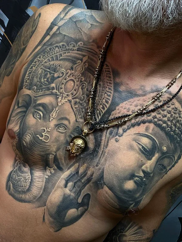 male black and grey realism tattoo auf chest #52669 | Tätowierer Юрий Симакин