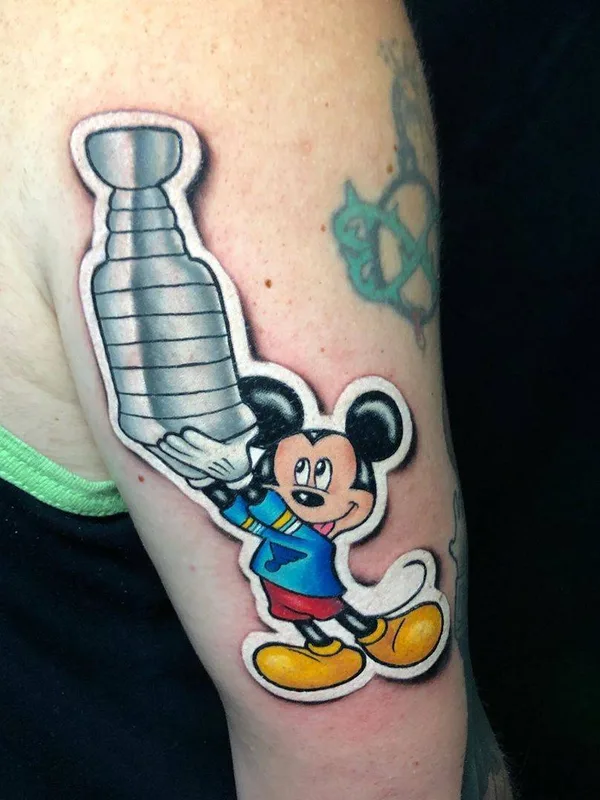 color cartoon 纹身 在 upper arm #30794 | 纹身师 Luke Cormier