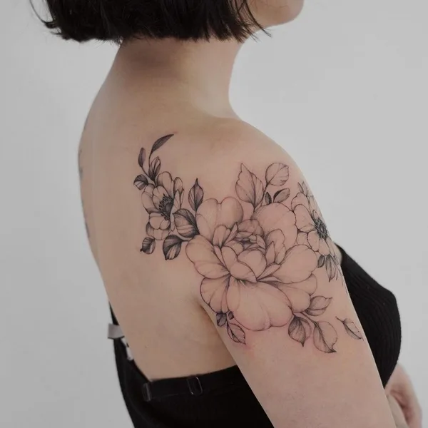 Feminine tattoo by Yarina Tereshchenko in Kyiv