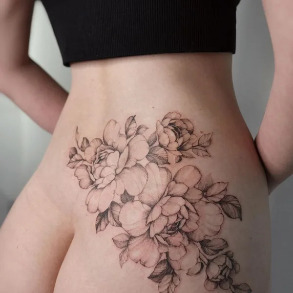 Feminine tattoo by Yarina Tereshchenko in Kyiv