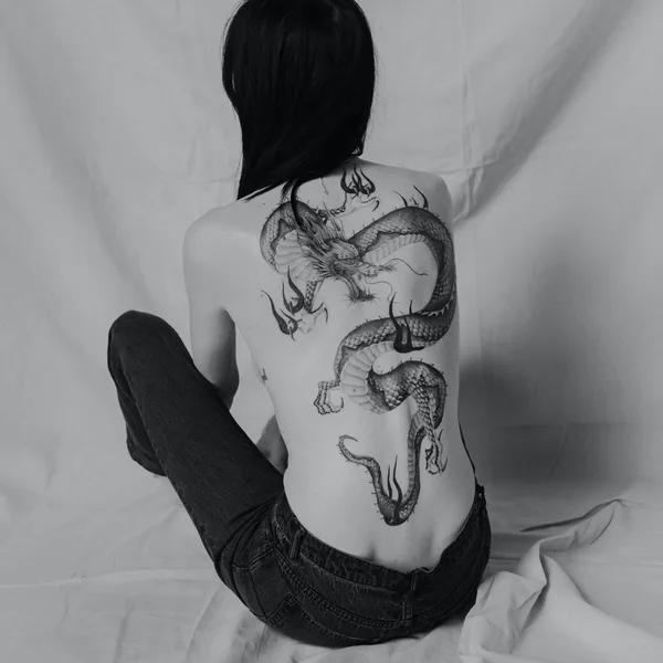 Graphic tattoo by Delphin Musquet in London