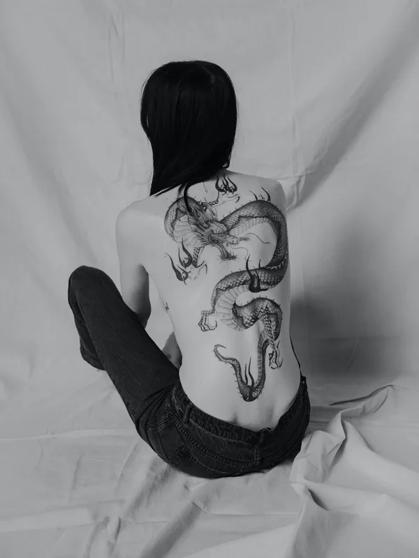 Graphic tattoo by Delphin Musquet in London