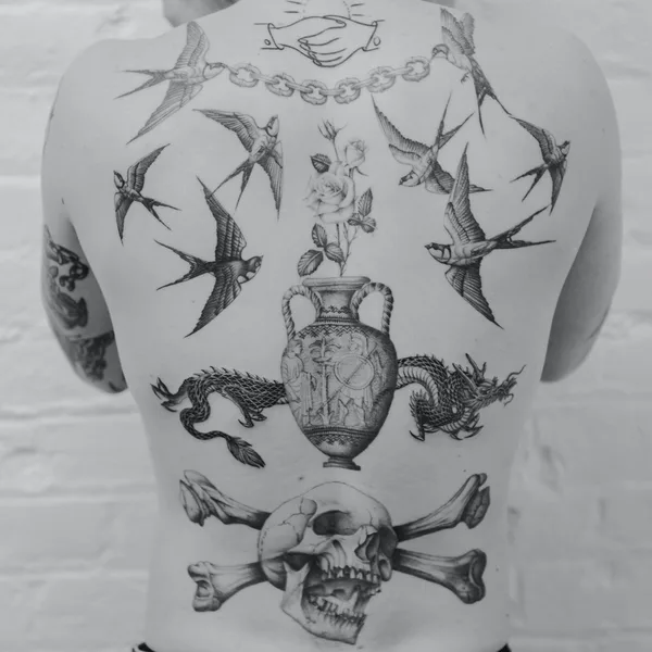 Graphic tattoo by Delphin Musquet in London
