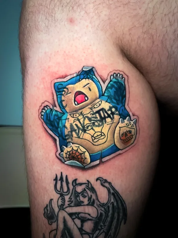 color cartoon tatuaje en thigh #73174 | Tatuador Kate Perets