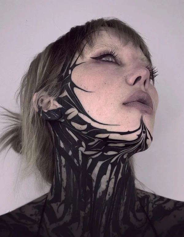 female black blackwork татуировка на face #75422 | Тату мастер Bastian Blau