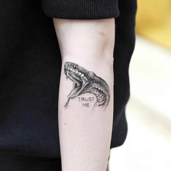 Graphic tattoo by Alessandro Capozzi in Roma